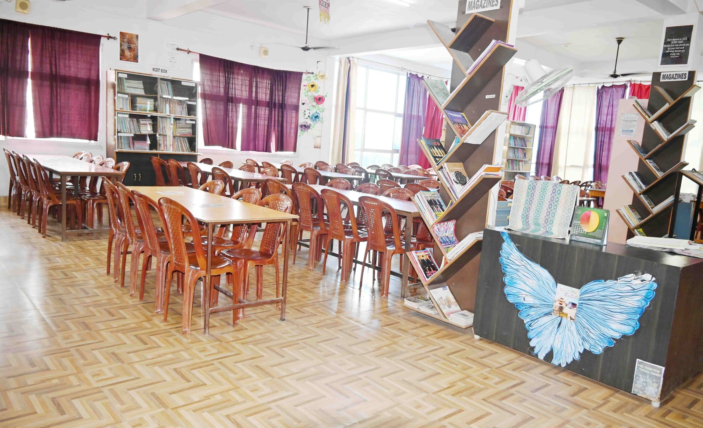 The Nalanda Library reading room at Sunbeam School Ballia, its magazine racks stocked and the reading tables set out.